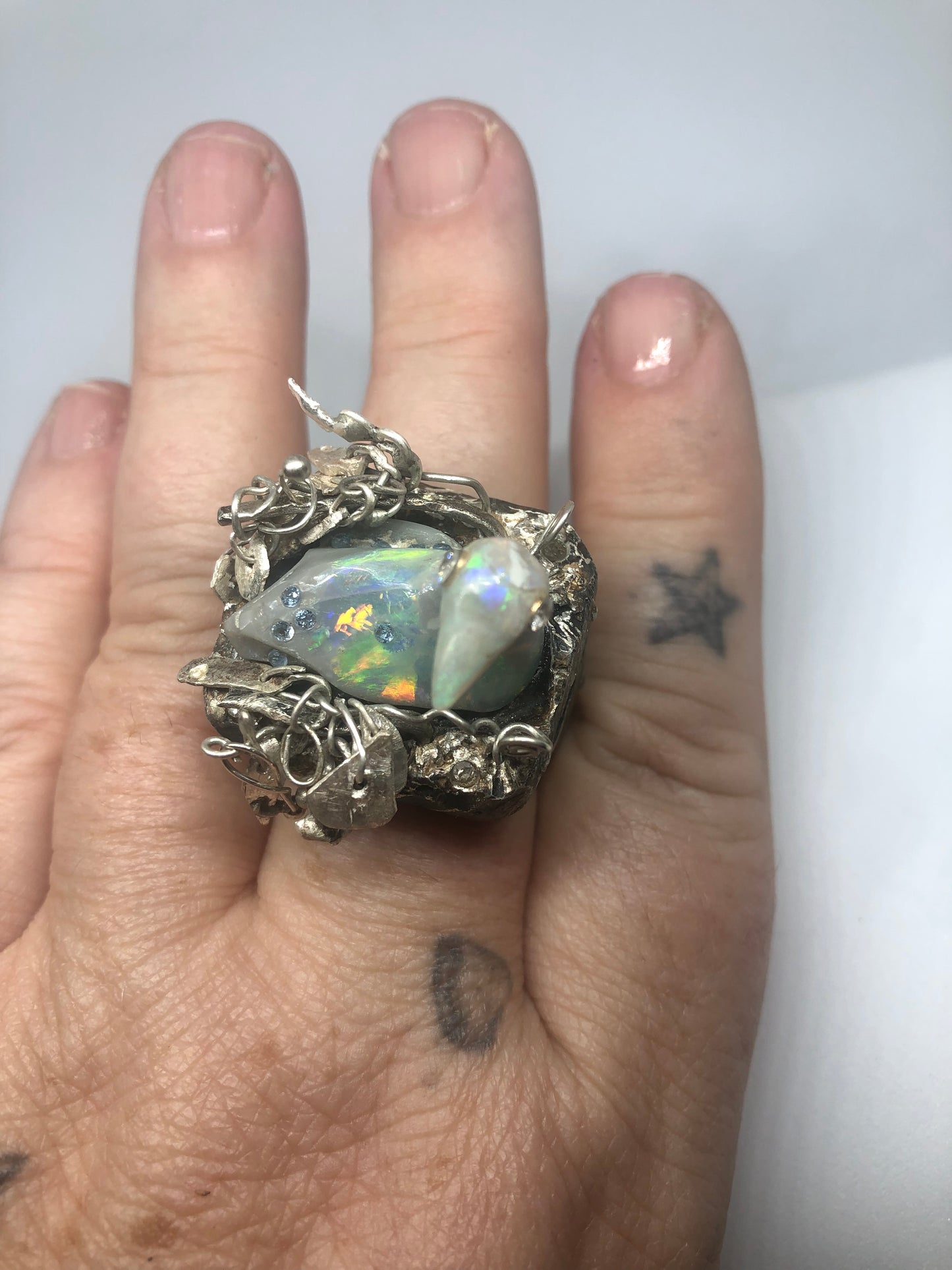 Opal Carved Bird taking a bath