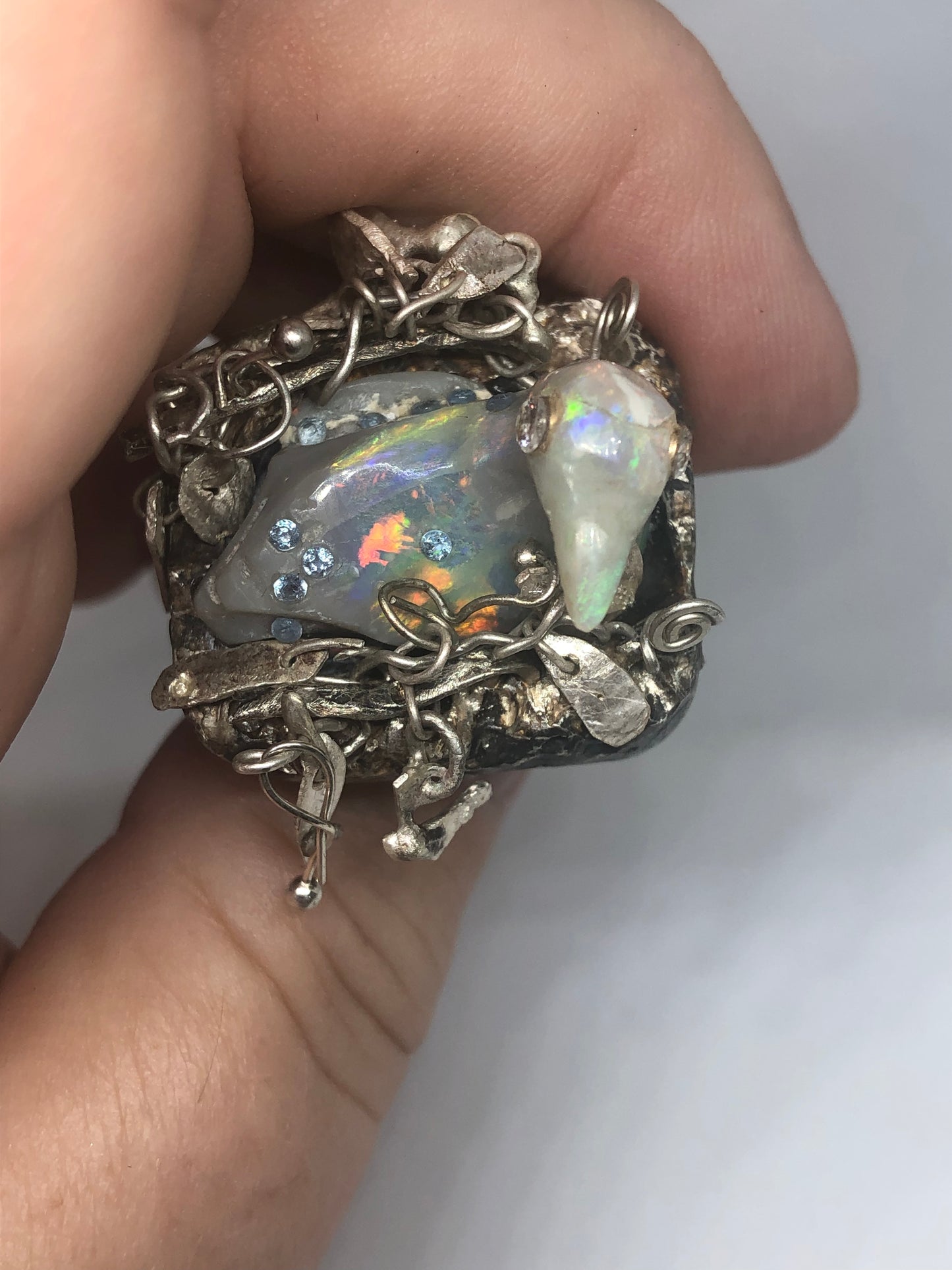 Opal Carved Bird taking a bath