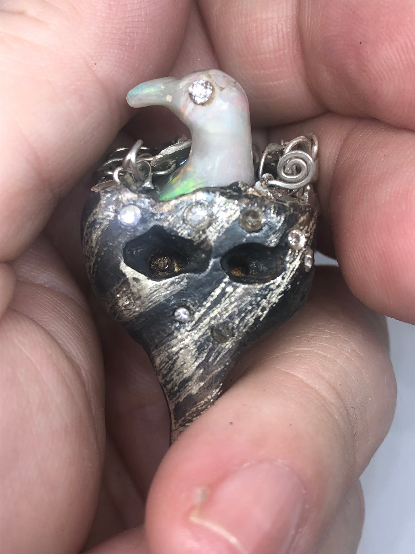 Opal Carved Bird taking a bath