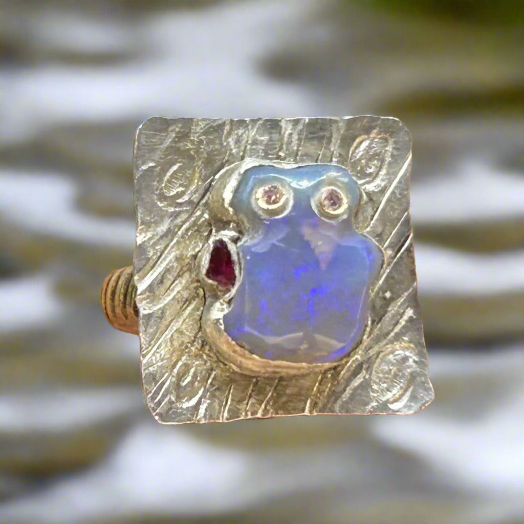 "Little Red hand Man" Carved opal, diamonds silver gold