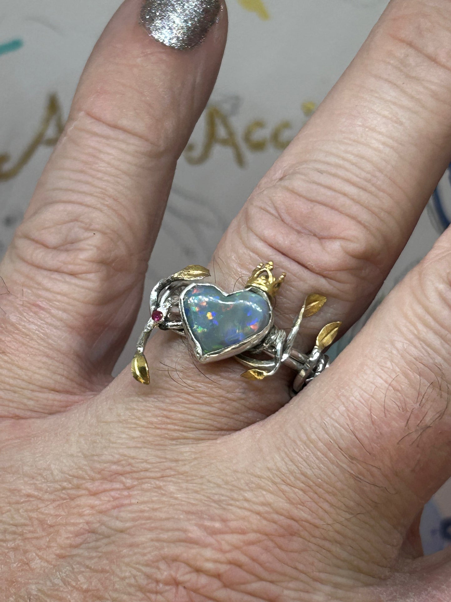 Queen of Hearts, Opal vine ring