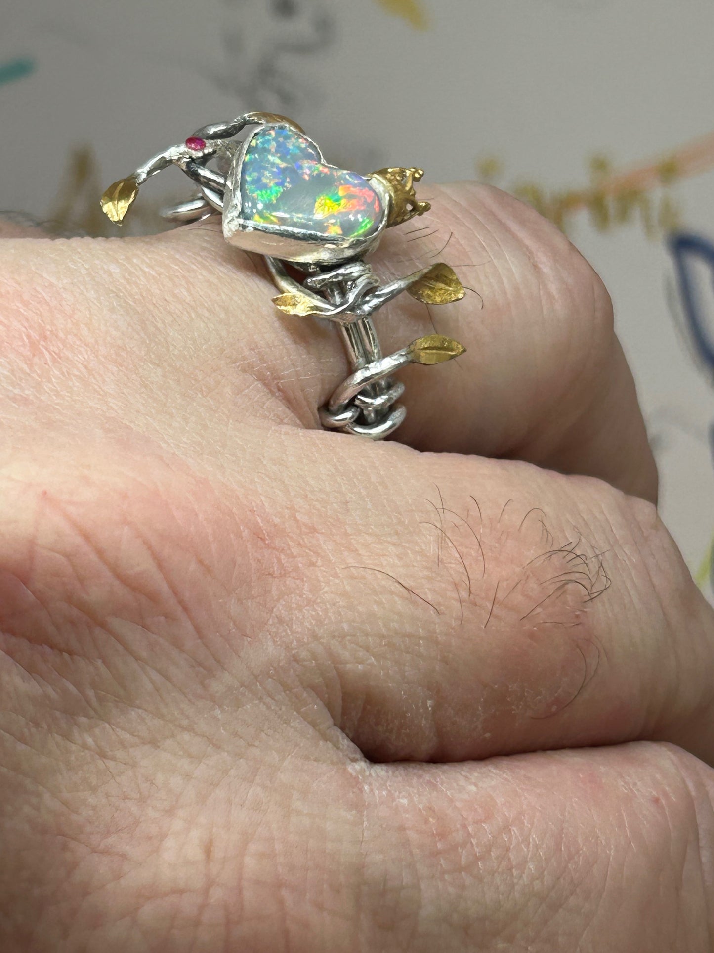 Queen of Hearts, Opal vine ring