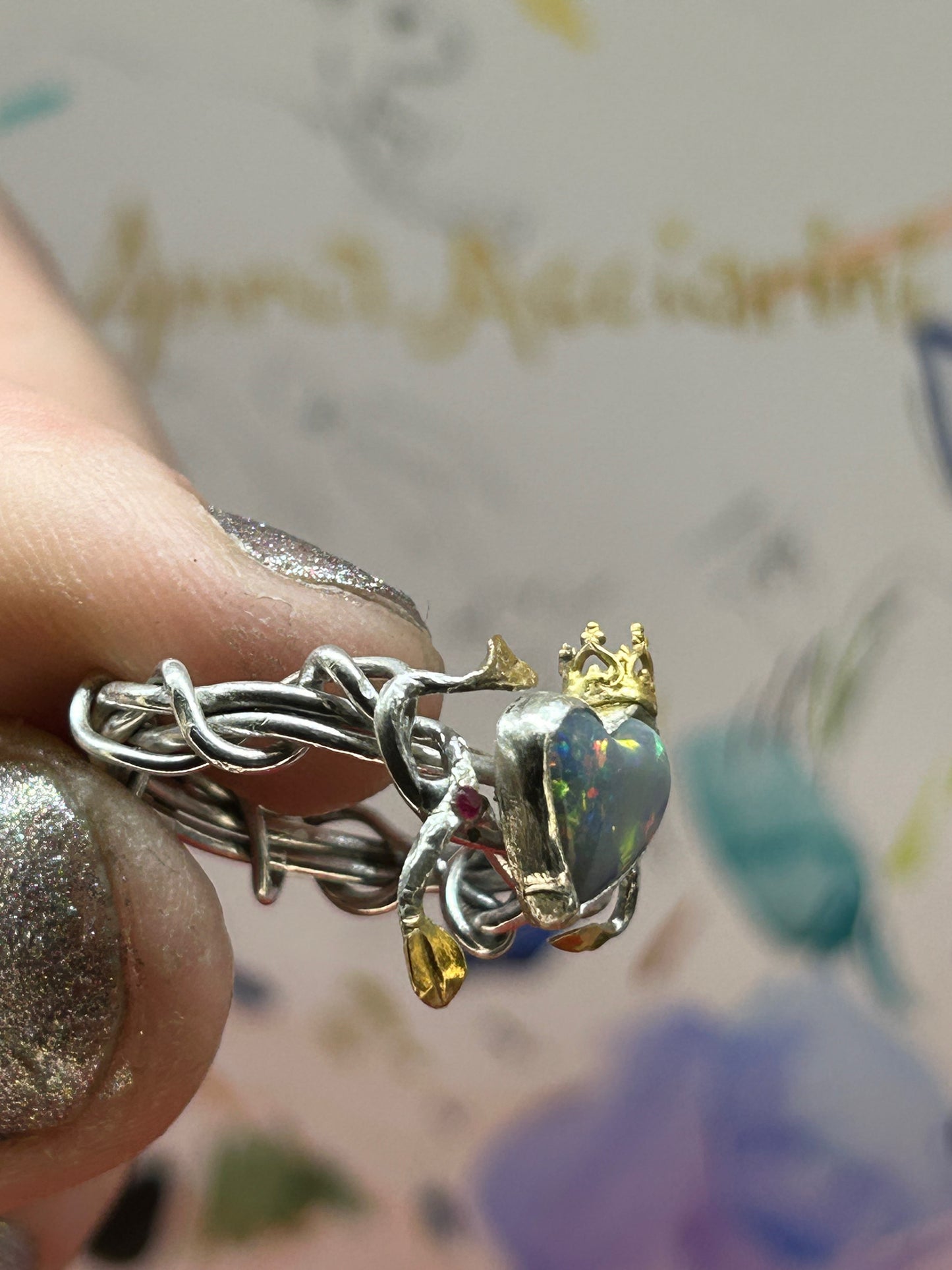 Queen of Hearts, Opal vine ring